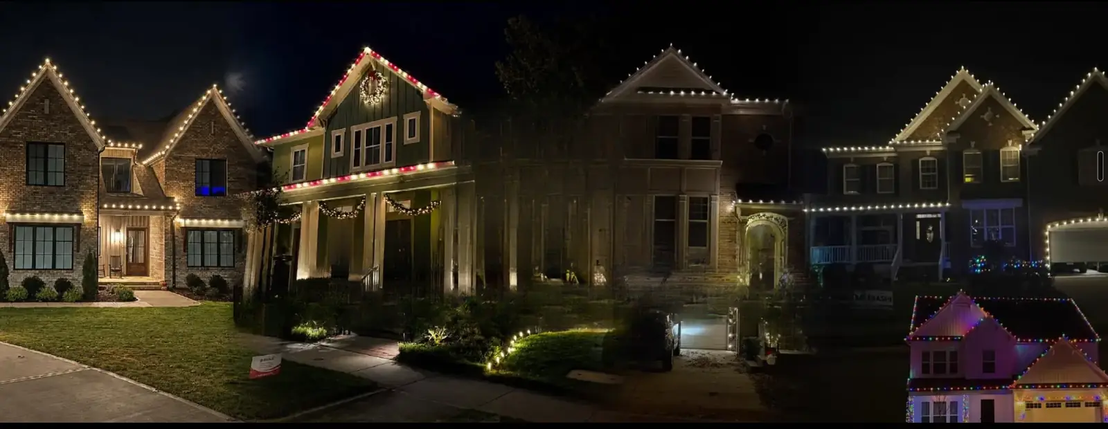 Professional Christmas light installation on a home exterior